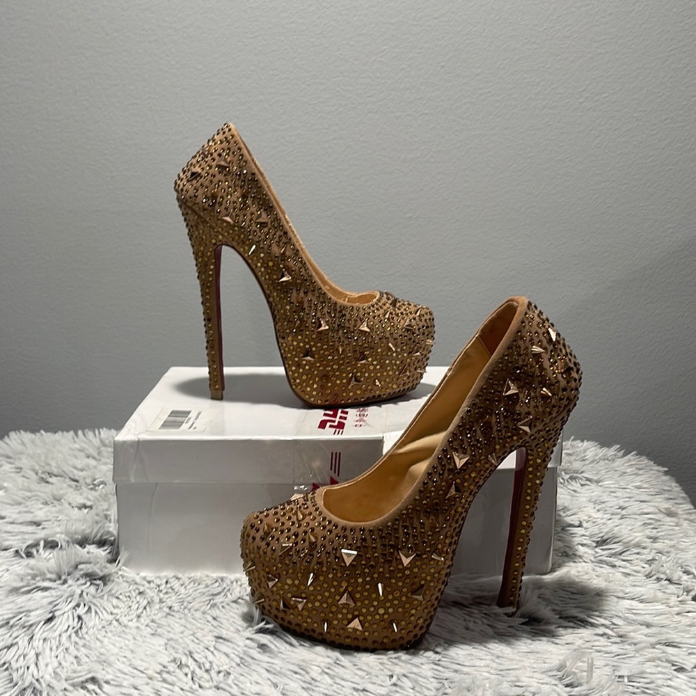 COPY - COPY - High hills gold pumps w/ spikes size 6